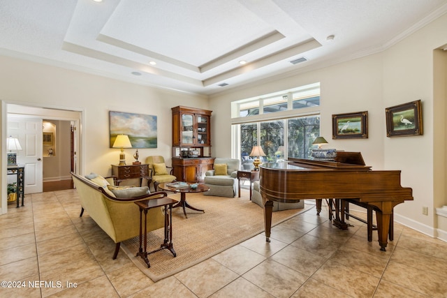 living area featuring a raised ceiling, crown molding, and light tile patterned flooring