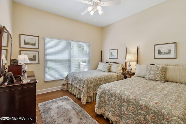 bedroom featuring dark hardwood / wood-style floors and ceiling fan