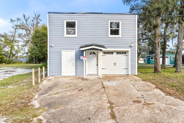 view of front of property featuring a garage