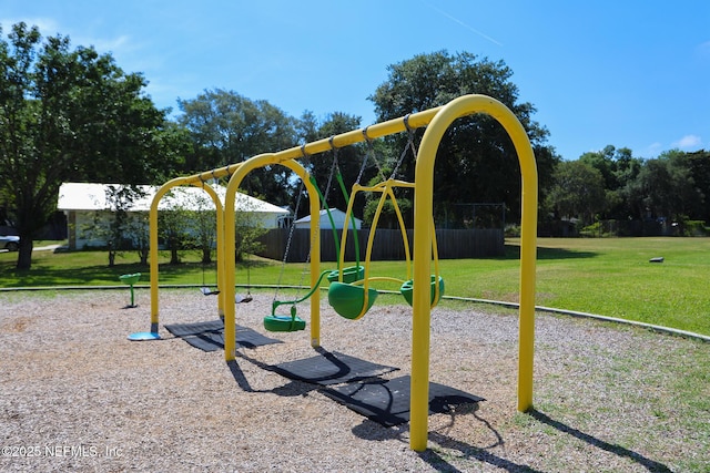 view of playground featuring a lawn