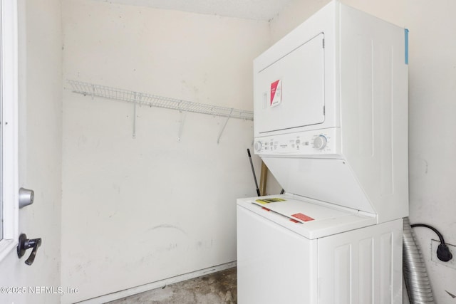 laundry area with laundry area and stacked washing maching and dryer