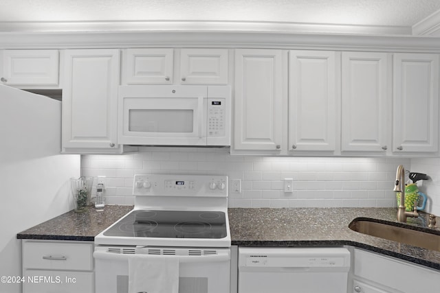 kitchen featuring backsplash, white cabinetry, white appliances, and sink