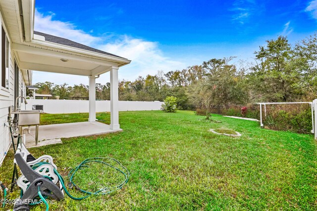 view of yard with a patio