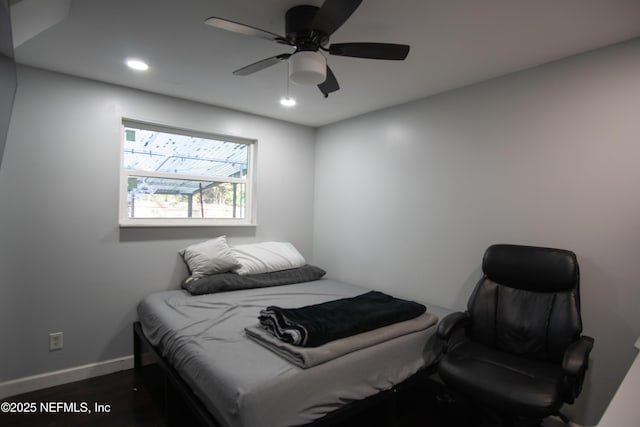 bedroom with baseboards, dark wood-style flooring, a ceiling fan, and recessed lighting