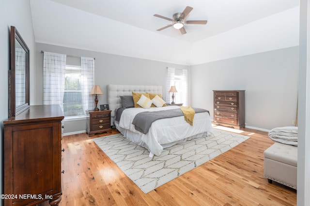 bedroom with light wood-type flooring and ceiling fan