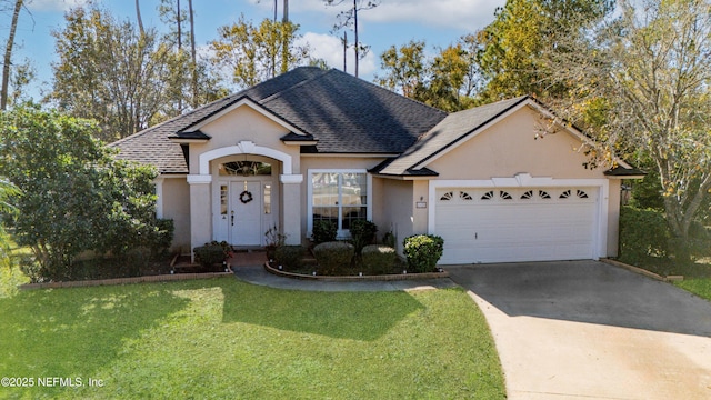 ranch-style home with a front lawn and a garage