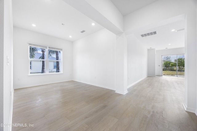 empty room with light wood-type flooring