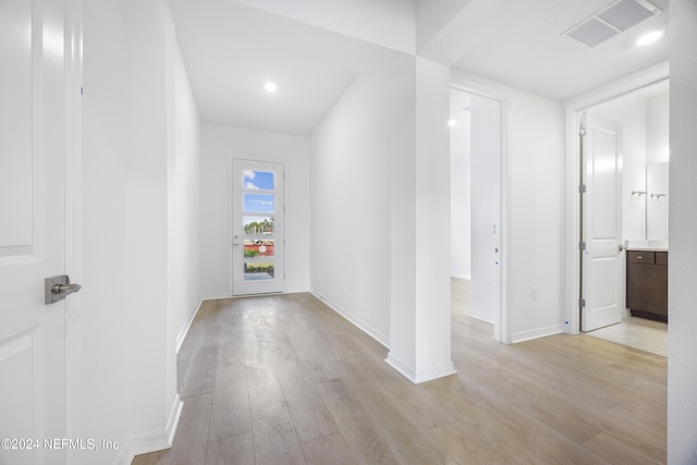 hallway featuring light hardwood / wood-style flooring