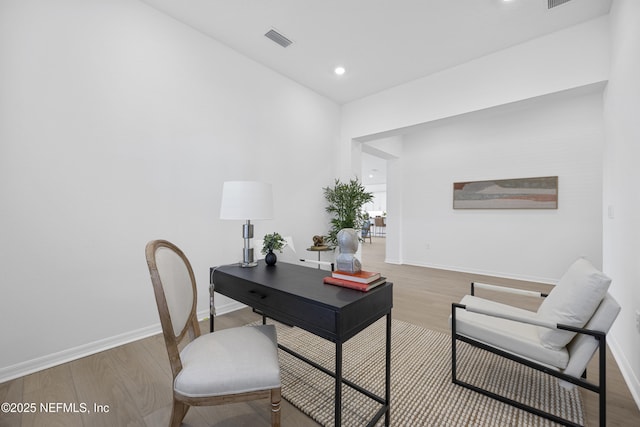 home office featuring wood-type flooring