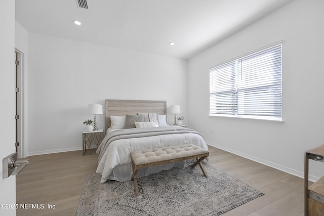 bedroom featuring light hardwood / wood-style floors