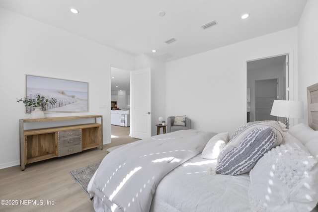 bedroom featuring light hardwood / wood-style flooring