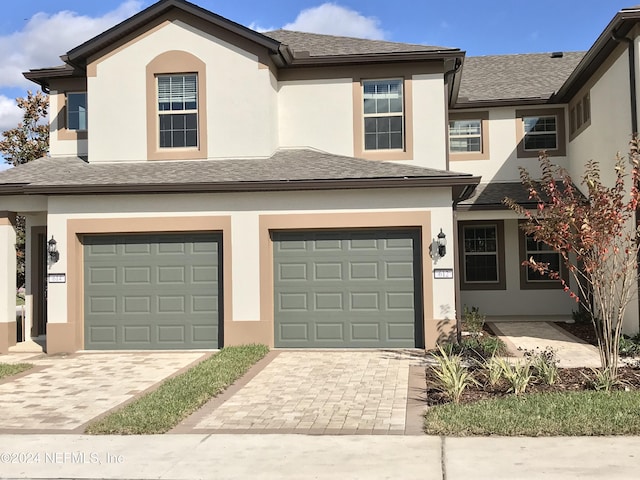 view of front of home with a garage