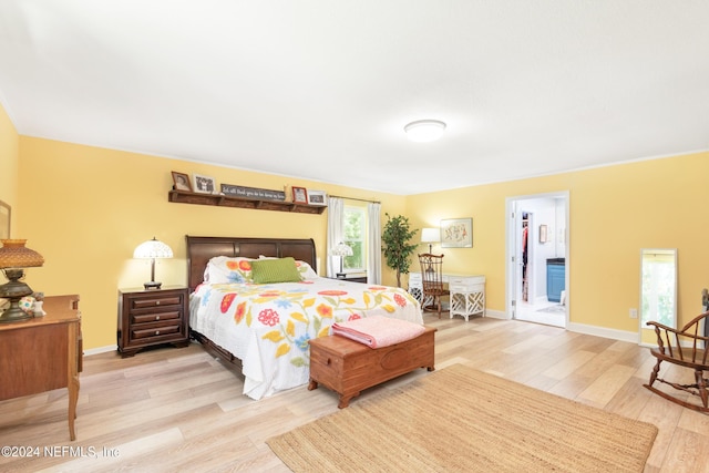 bedroom featuring light wood-type flooring