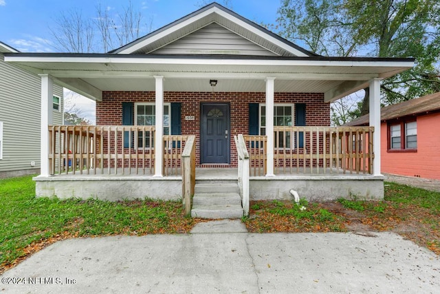 bungalow-style house featuring covered porch