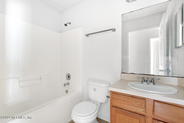 full bathroom with shower / bathing tub combination, vanity, and toilet