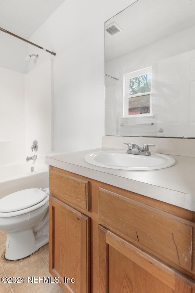 full bathroom with toilet, vanity, bathing tub / shower combination, and tile patterned floors