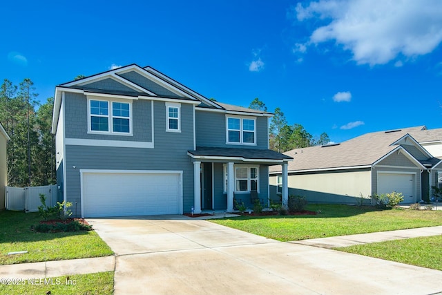 view of front facade featuring a front lawn, a porch, and a garage