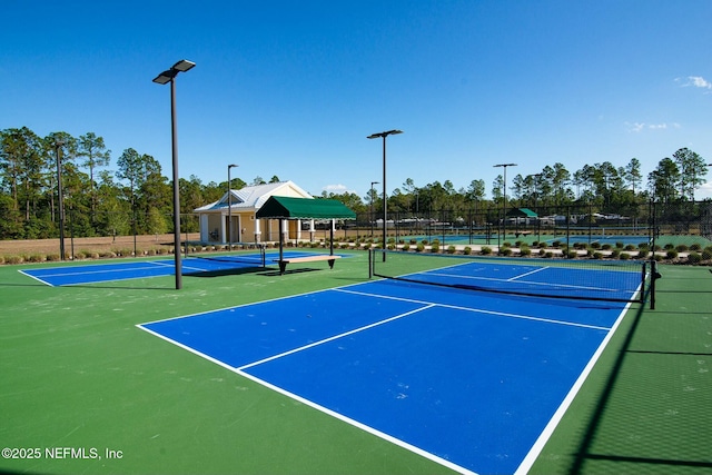 view of tennis court with basketball court