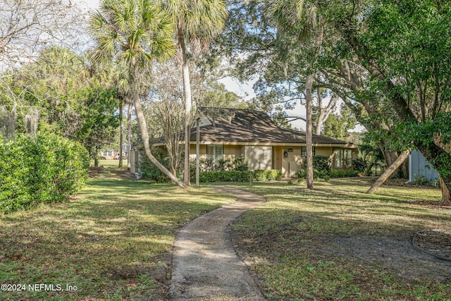 exterior space with a front lawn