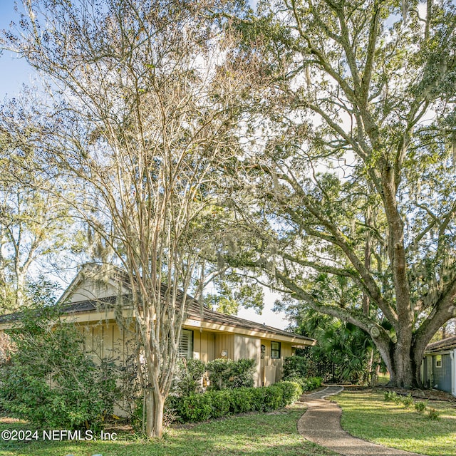 exterior space with a front lawn