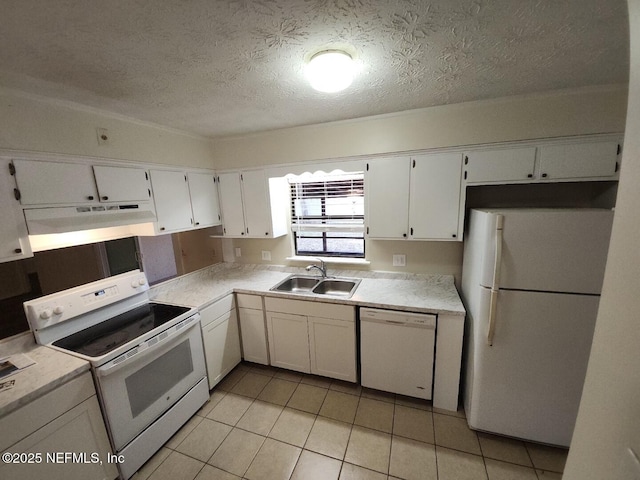 kitchen with light countertops, white appliances, and under cabinet range hood