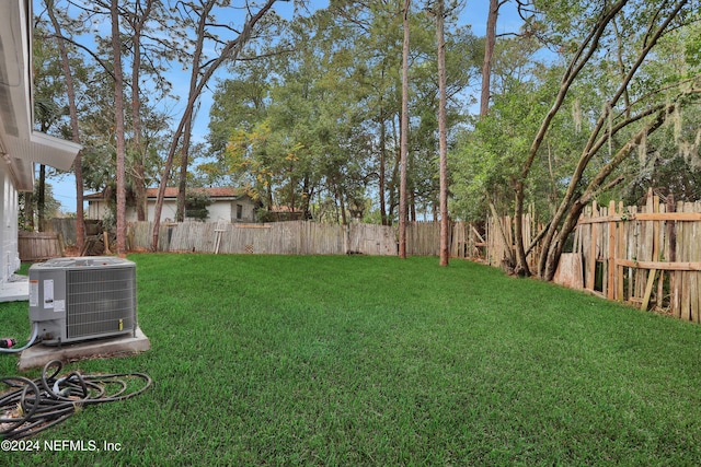 view of yard featuring central AC