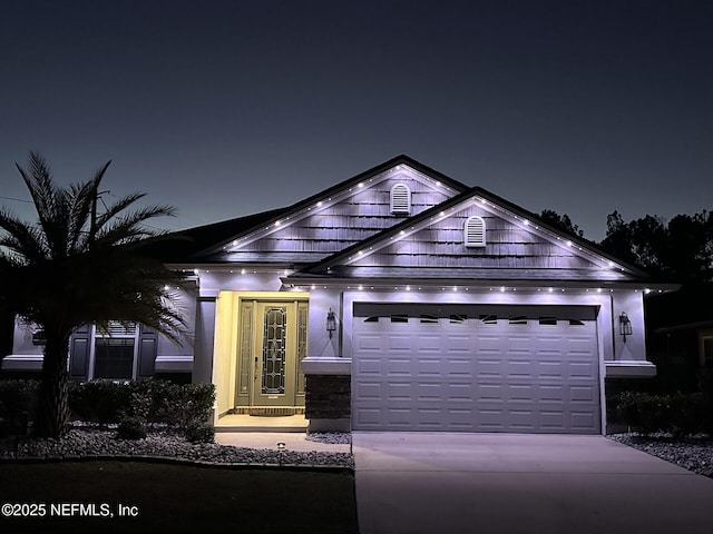 view of front of home featuring a garage