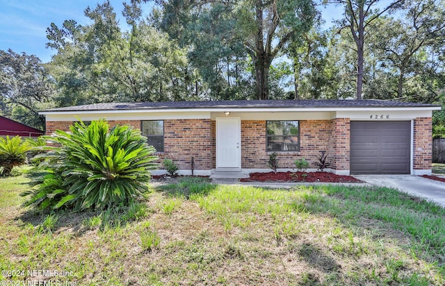 4266 Key Adam Dr, Jacksonville, FL 32218 - single story home featuring a garage