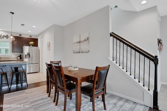 dining room featuring light wood-type flooring