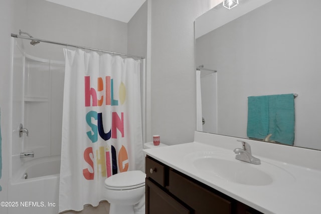 full bathroom featuring toilet, vanity, and shower / bath combination with curtain