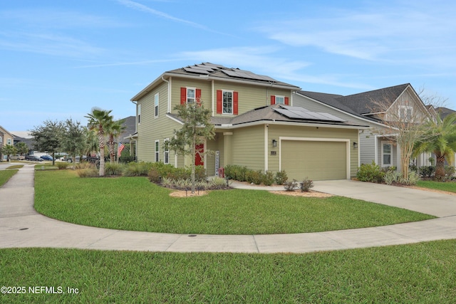 view of front of home with a garage, a front lawn, and solar panels