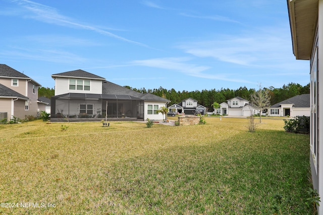 view of yard with a lanai