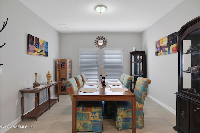 dining room featuring light hardwood / wood-style floors