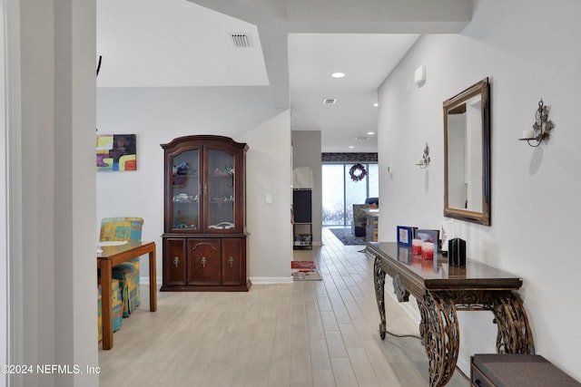 corridor featuring light hardwood / wood-style flooring