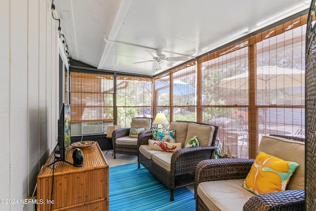 sunroom with ceiling fan and cooling unit