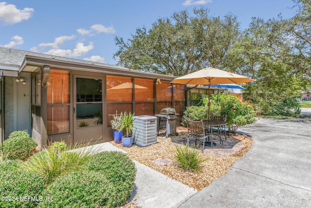 view of patio / terrace with grilling area and central AC unit