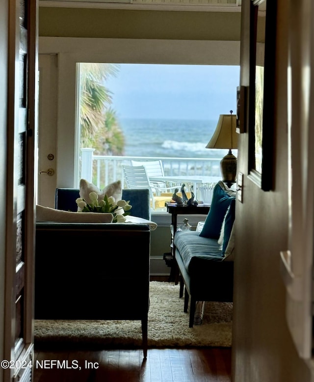 living area with a water view