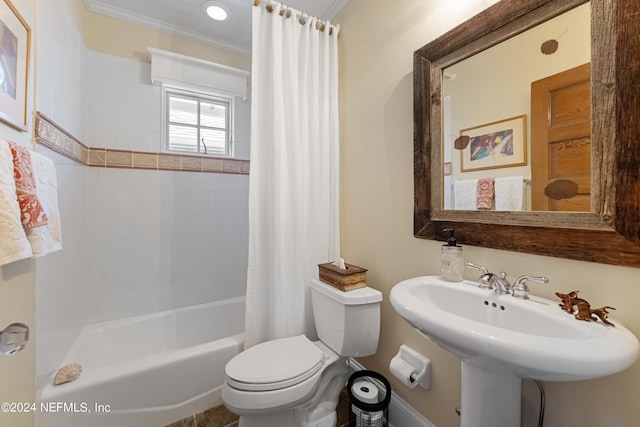 full bathroom with sink, shower / bath combination with curtain, toilet, and crown molding