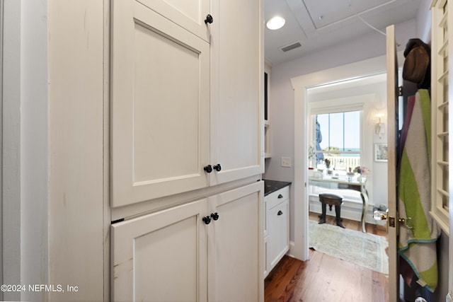 hall featuring dark hardwood / wood-style floors