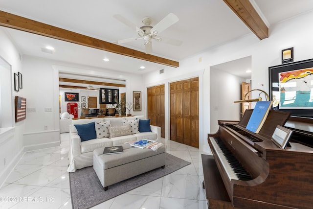 living room with beam ceiling and ceiling fan