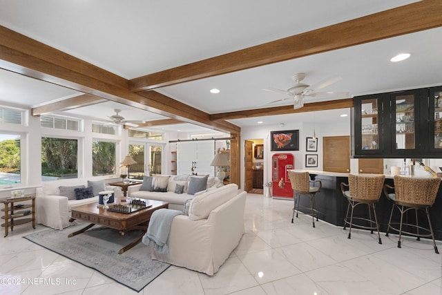 living room featuring french doors and beamed ceiling