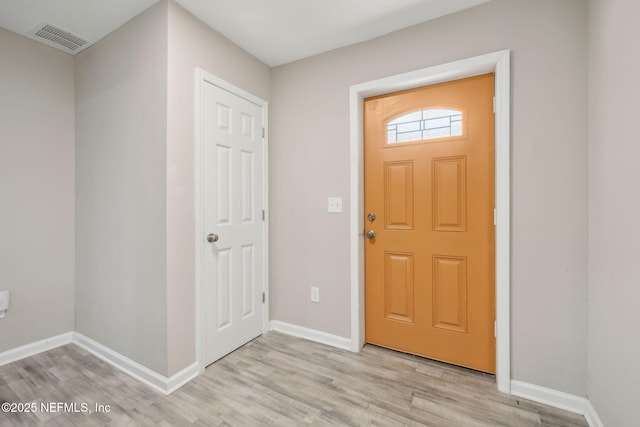 foyer entrance featuring light hardwood / wood-style floors