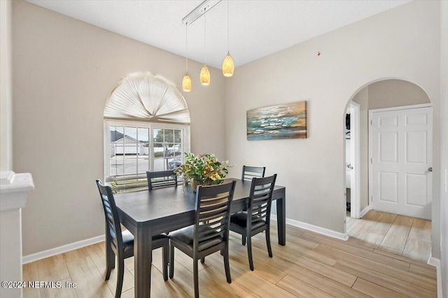 dining room with light wood-type flooring