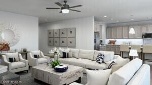 living room featuring ceiling fan and mail area