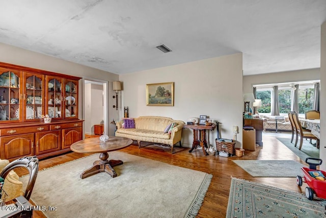 living room featuring dark hardwood / wood-style floors