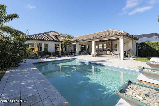 view of pool featuring a patio