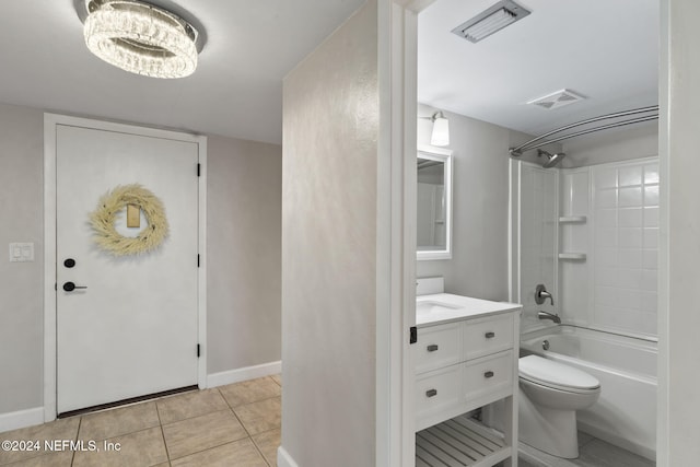 full bathroom featuring tile patterned floors, vanity, toilet, and bathtub / shower combination