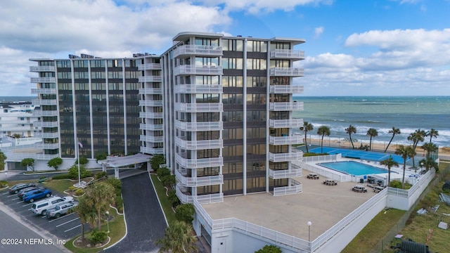 view of building exterior featuring a water view