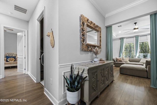 corridor featuring dark hardwood / wood-style flooring and ornamental molding