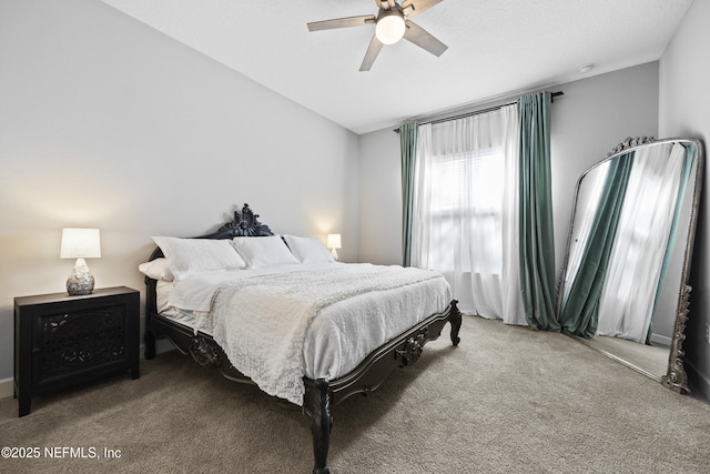 bedroom featuring carpet flooring, ceiling fan, and lofted ceiling